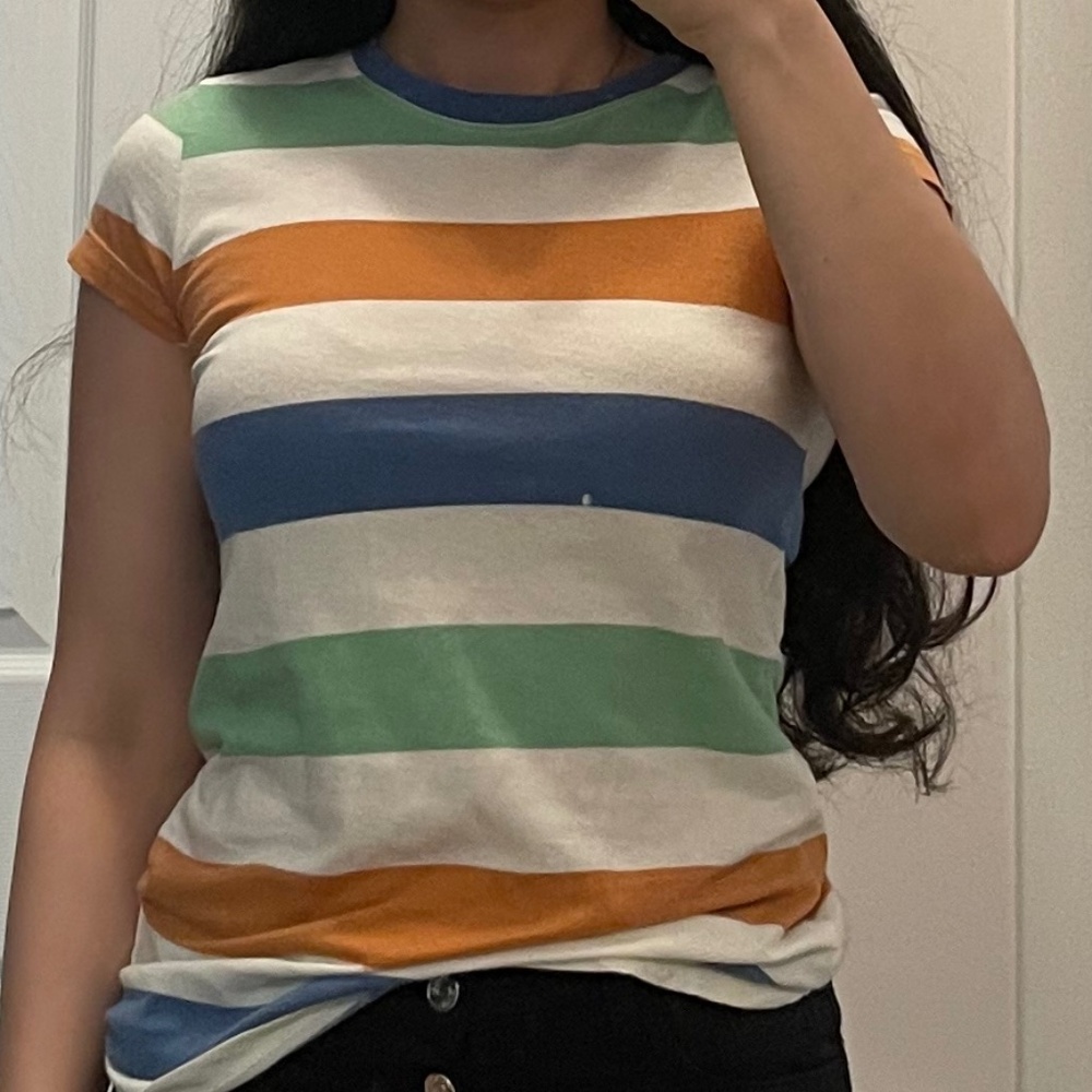 White Tee with Dark Orange, Blue, and Green Stripes.
